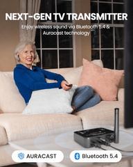 Older adult watching TV with black Infinity NC ANC earbuds and the Audikast 4 Auracast transmitter