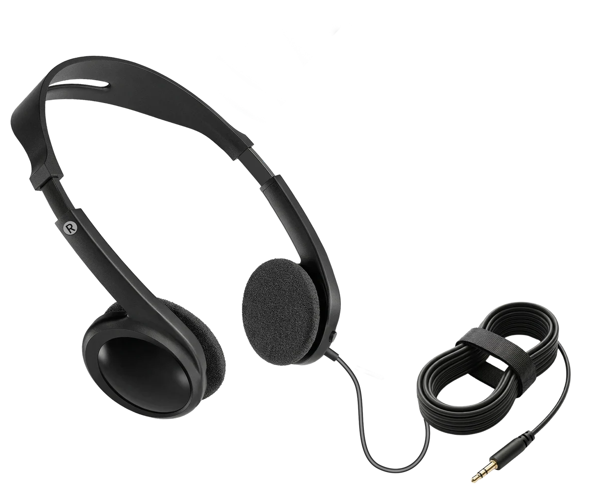 Headphones worn over hearing aids